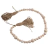 The Round Top Collection Wooden Bead Garland With Tassels